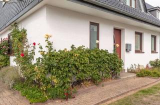 Doppelhaushälfte kaufen in 24539 Wittorf, Wohnen mit Charme & Zukunft – energetisch modernisierte Doppelhaushälfte