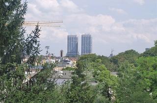 Wohnung kaufen in 55122 Mainz, PROVISIONSFREI Mainz zu Füßen - Traumhafte 2,5-Zimmer-Maisonettewohnung mit Blick über die City