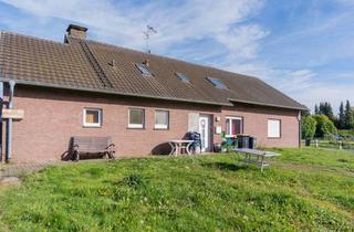 Einfamilienhaus kaufen in Mitteldeich 23, 47559 Kranenburg, Großzügiges Einfamilienhaus mit Einliegerwohnung, zwei Garagen und weitläufigem Grundstück mit Natur