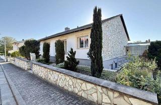 Haus kaufen in 67592 Flörsheim-Dalsheim, Großzügiger Bungalow mit Einliegerwohnung, Wintergarten und außergewöhnlicher Doppelgarage