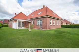 Haus kaufen in 26524 Berumbur, Wohnhaus mit Kaminofen, Garage und zusätzlichem Ausbaupotenzial