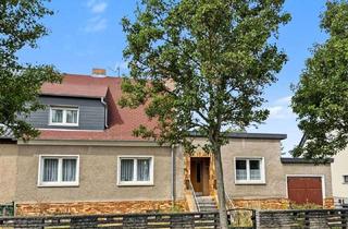 Doppelhaushälfte kaufen in 39418 Staßfurt, Charmante Doppelhaushälfte mit großem Grundstück in Staßfurt