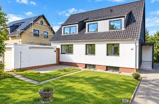 Haus kaufen in 38304 Wolfenbüttel, Viel Platz für Ihre Zukunft! Modernisiertes Zweifamilienhaus auf 666 m² Eigentumsgrundstück