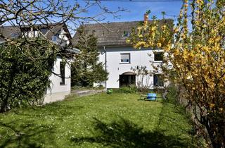 Anlageobjekt in 65201 Dotzheim, Gepflegtes Mehrfamilienhaus in guter Wohnlage mit 4 Wohnungen und großem Garten
