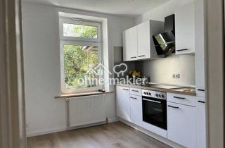 Wohnung kaufen in Kronsforder Allee 127A, 23560 Lübeck, Attraktive Kapitalanlage in Lübeck: Vermietete 2-Zimmer-EG-Wohnung mit Balkon & eigenem Garten