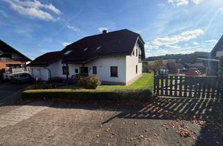 Wohnung mieten in Am Sonnenhang, 54578 Oberbettingen, Wohnen mit Weitblick: 4-Zimmer-Gartenwohnung mit Kaminofen, überdachter Terrasse und Garage
