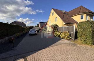 Doppelhaushälfte kaufen in 24610 Trappenkamp, Moderne Doppelhaushälfte in Sackgassenendlage in Trappenkamp