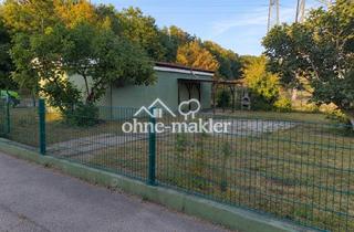 Lager kaufen in 79761 Waldshut-Tiengen, 423 m² Grundstück mit vermieteten Garagen & Entwicklungspotenzial in Waldshut