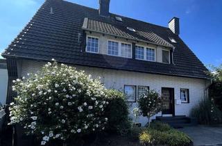 Wohnung kaufen in 47495 Rheinberg, Besondere Maisonette-Wohnung mit Kamin, zwei Balkonen und Garage