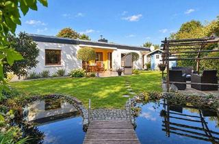 Haus kaufen in 25451 Quickborn, Charmanter Bungalow mit Garten, Südwest-Terrasse, Kamin und Sauna - ideal für Familien!