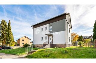 Mehrfamilienhaus kaufen in 61138 Niederdorfelden, Raum für Lebensideen – Mehrfamilienhaus mit Garten, Balkon und Terrasse