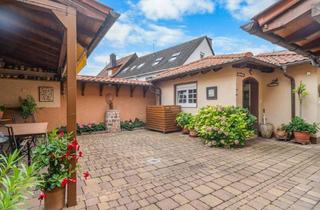 Doppelhaushälfte kaufen in Niederhofheimerstr. 16, 65719 Hofheim am Taunus, Charmante Doppelhaushälfte mit schön angelegtem Innenhof, Terrasse und Garage