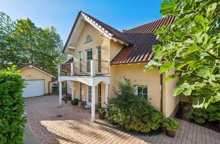 Haus kaufen in 55546 Fürfeld, Licht und Weite – außergewöhnliches Wohnen mit offener Galerie, Kamin und privater Gartensauna