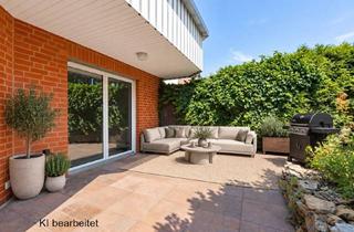 Wohnung kaufen in 49134 Wallenhorst, Exklusive 4-Zimmer-Erdgeschosswohnung mit Garten in ruhiger Lage von Hollage