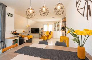 Wohnung kaufen in 76344 Eggenstein-Leopoldshafen, Großzügige Maisonettewohnung mit zwei Terrassen und Balkon – Wohnen auf zwei Ebenen