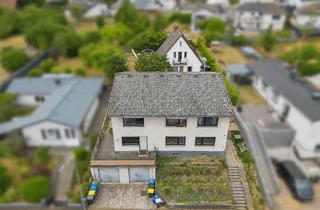 Einfamilienhaus kaufen in 35321 Laubach, Zwei Häuser – 8,57 % Bruttorendite – 858 m² Grundstück | Attraktive Kapitalanlage in Laubach!