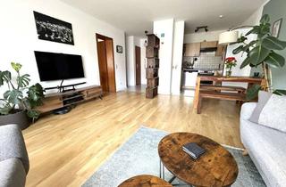Wohnung kaufen in 65428 Rüsselsheim, Gepflegte Zweizimmerwohnung mit Süd-West Terrasse und eigenem Garten in ruhiger Wohnlage