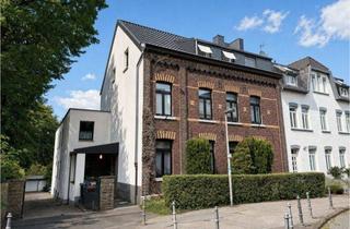 Mehrfamilienhaus kaufen in 52072 Aachen, gepflegtes Mehrfamilienhaus mit Baugrundstück in Aachen-Laurensberg