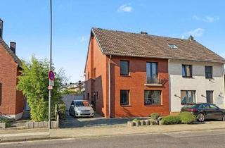 Doppelhaushälfte kaufen in 52499 Baesweiler, Baesweiler - charmante Doppelhaushälfte in zentraler Lage mit schönem Garten und großem Carport