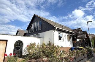 Haus kaufen in 65468 Trebur, Ein Klassiker mit Mehrwert! Solide 112 m² Wfl im EG - plus - 50 m² wohnlich ausgebaute DG-Romantik