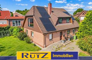 Haus kaufen in 27777 Ganderkesee, Ganderkesee | Zweifamilienhaus mit PV-Anlage und Garage direkt im Zentrum
