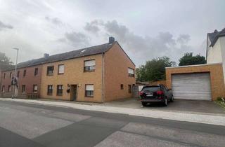 Einfamilienhaus kaufen in 41569 Rommerskirchen, Einfamilienhaus mit Garage und Garten