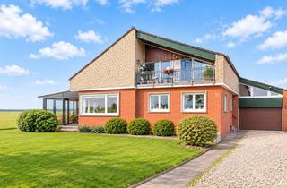 Haus kaufen in 47551 Bedburg-Hau, Wohnen mit Wiesenblick – vielseitiges ZFH/MFH in Bedburg-Hau, Louisendorf