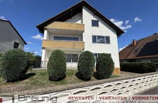 Mehrfamilienhaus kaufen in 63538 Großkrotzenburg, Mehrfamilienhaus mit 3-4 Wohneinheiten, Terrasse, zwei Balkonen und zwei Garagen in Großkrotzenburg