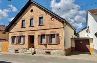 Haus kaufen in 55444 Schweppenhausen, Haus mit Sanierungsbedarf und zusätzlicher Baufläche, 1.558 m² in Schweppenhausen