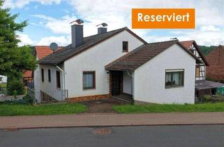 Haus kaufen in 37299 Weißenborn, Preisgünstiger Bungalow mit fünf Garagen
