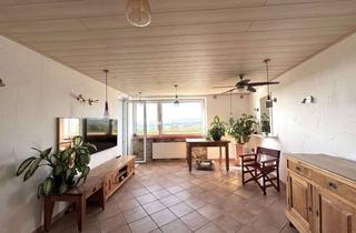 Wohnung kaufen in 65824 Schwalbach, Wohnen wie im Urlaub - Mediterranes Wohngefühl mit traumhaftem Taunusblick