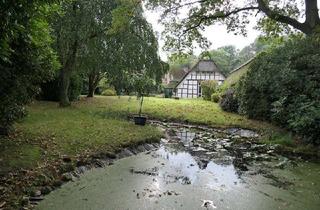 Haus kaufen in 21755 Hechthausen, Leben unter Reetdach auf parkähnlichem Grundstück in Randlage
