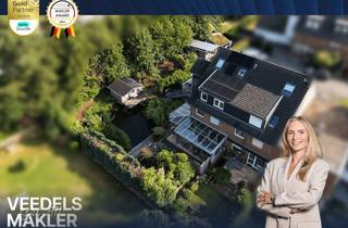Haus kaufen in 41516 Grevenbroich, Wohnen mit Mieteinnahmen – Energieeffizientes Zweifamilienhaus mit Seltenheitswert