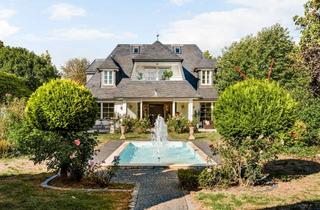 Villa kaufen in 63486 Bruchköbel, Villa im eigenen Park – Indoorpool, 2.480 m² Grundstück & außergewöhnliche Privatsphäre