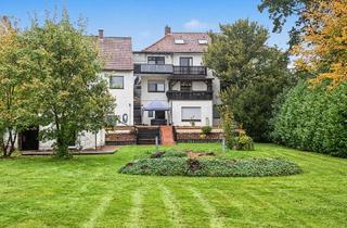 Mehrfamilienhaus kaufen in 32609 Hüllhorst, Mehrfamilienhaus mit vier Wohneinheiten und großzügigem Garten in Hüllhorst-Schnathorst