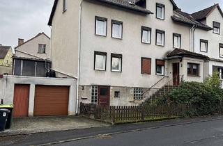 Doppelhaushälfte kaufen in 34225 Baunatal, Doppelhaushälfte mit zwei Garagen und Werkstattgebäude