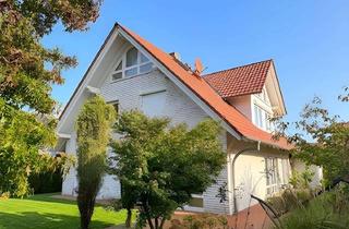 Einfamilienhaus kaufen in 31535 Neustadt, Exklusives Einfamilienhaus mit Kamin, Doppelgarage und großem Grundstück in Neustadt am Rübenberge