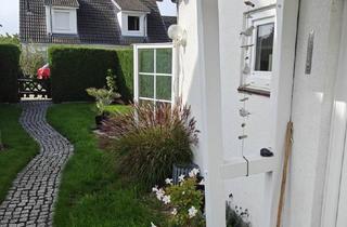 Wohnung kaufen in 23743 Grömitz, Galerie-Eigentumswohnung mit kleinem geschützten Garten auf Eigenland - provisionsfrei