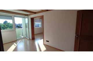 Wohnung kaufen in 83607 Holzkirchen, Renovierungsbedürftige 4-Zimmer-Dachgeschosswohnung mit Balkon in Holzkirchen