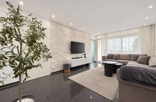 Wohnung kaufen in 40789 Monheim, Modernisierte 3 Zimmer Eigentumswohnung mit Einbauküche mit Süd-Ost-Loggia