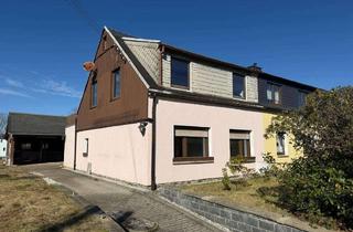 Doppelhaushälfte kaufen in 08294 Lößnitz, Gemütliche Doppelhaushälfte mit großzügigem Grundstück in ruhiger Lage von Lößnitz!