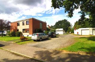 Haus kaufen in 46562 Voerde, 2-Familienhaus mit Nebengebäuden und großzügiger Gewerbehalle auf ca. 2.699 m² Grundstück
