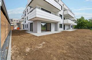 Wohnung kaufen in 61239 Ober-Mörlen, Im Erstbezug - KfW 55-Standard: Helle 3-Zimmer-Wohnung mit großem Gartenanteil und 2 Stellplätzen