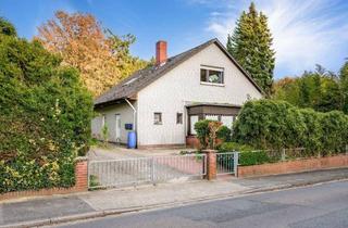 Haus kaufen in 27721 Ritterhude, Ein Haus mit vielen Möglichkeiten - drei Wohneinheiten auf großzügigem Grundstück
