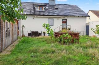 Einfamilienhaus kaufen in 31180 Giesen, Freistehendes, gepflegtes Einfamilienhaus mit Einliegerwohnung, Souterrain und Garage in Emmerke
