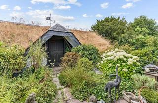 Haus kaufen in Hauptstraße 89a, 51399 Burscheid, Ein Hauch von Hobbit-Haus Wohnen unter dem begrünten Dach
