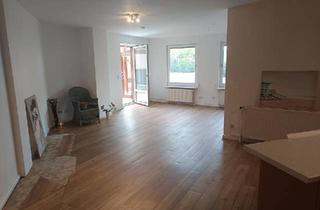 Wohnung kaufen in 23758 Oldenburg, Oldenburg in Holstein - Eigentumswohnung mit Wintergarten
