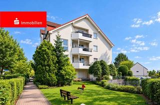 Wohnung kaufen in 65760 Eschborn, Eschborn: Großzügige Maisonettewohnung mit Terrasse und drei Tiefgaragenstellplätzen