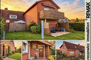 Doppelhaushälfte kaufen in 26603 Aurich, Wohnen und investieren in Aurich: vermietete Doppelhaushälfte ( 12.960 € p.a.) mit großzügigem Anba