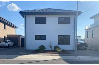 Einfamilienhaus kaufen in 52531 Übach-Palenberg, Modernes, freistehendes Einfamilienhaus mit zwei Garagen und großzügigem Garten in Übach-Palenberg